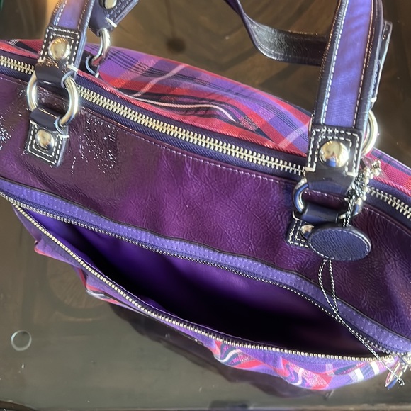 Coach Poppy design purse
Purple with some pink
Like new - Picture 2 of 6